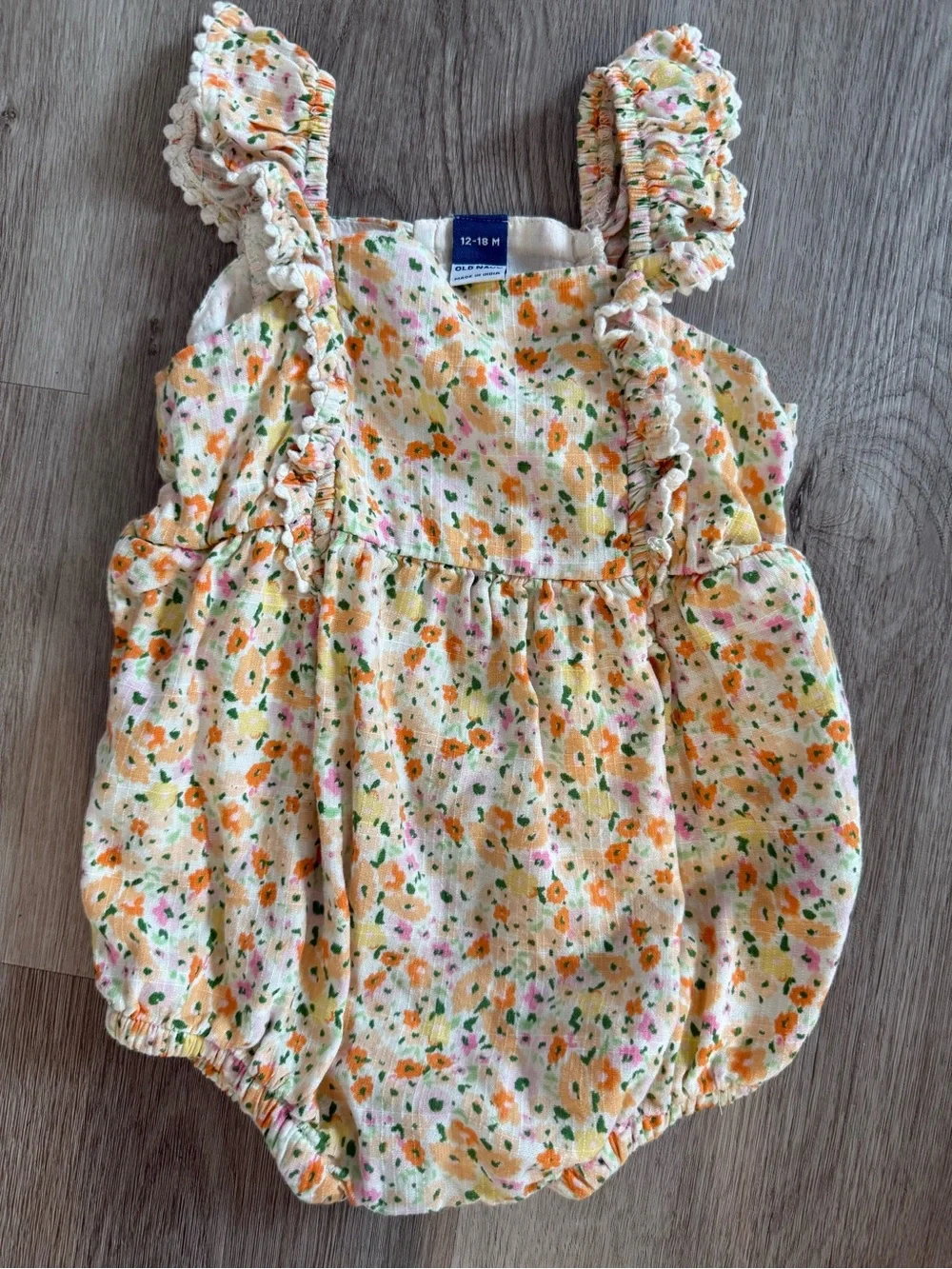 Old Navy Baby Floral Ruffle Romper in Cream, Orange, Green, Pink